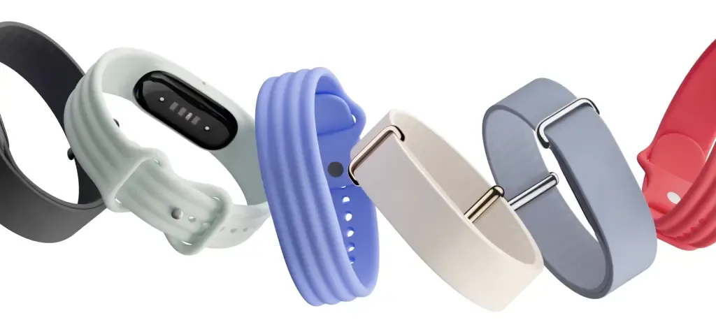 Fitbit Air in multiple colorways including sage, periwinkle, cream, slate, and red — all showing the slim band form factor